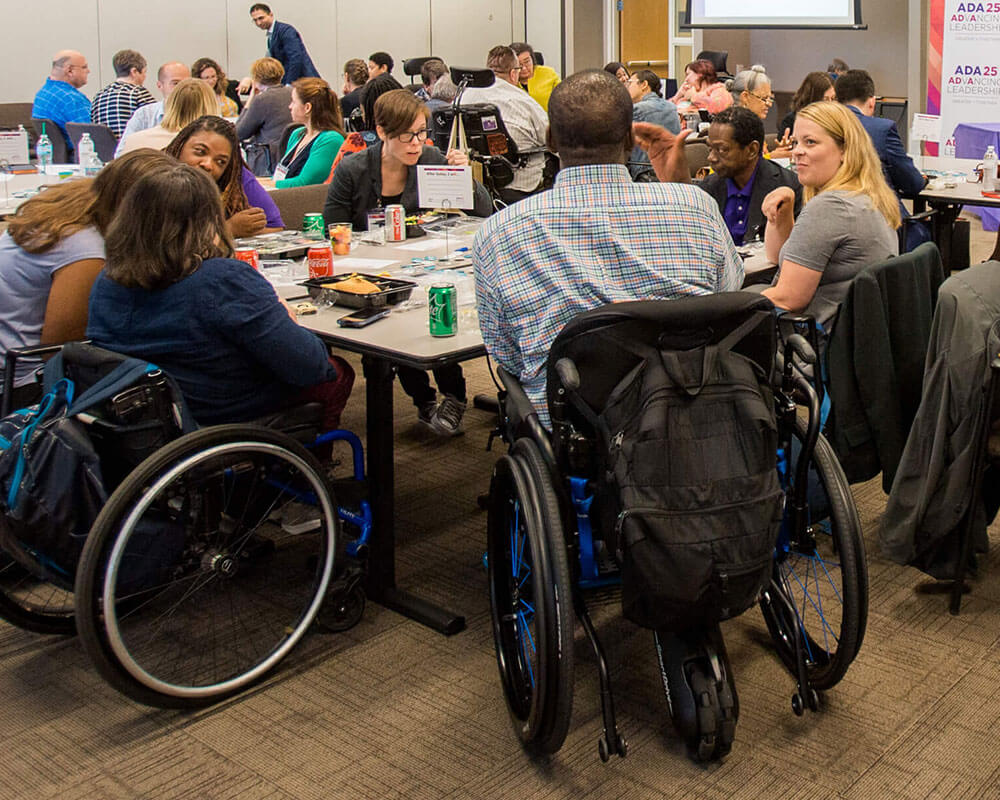 A group of Leaders with disabilities gather at an ADA 25 Advancing Leadership event.
