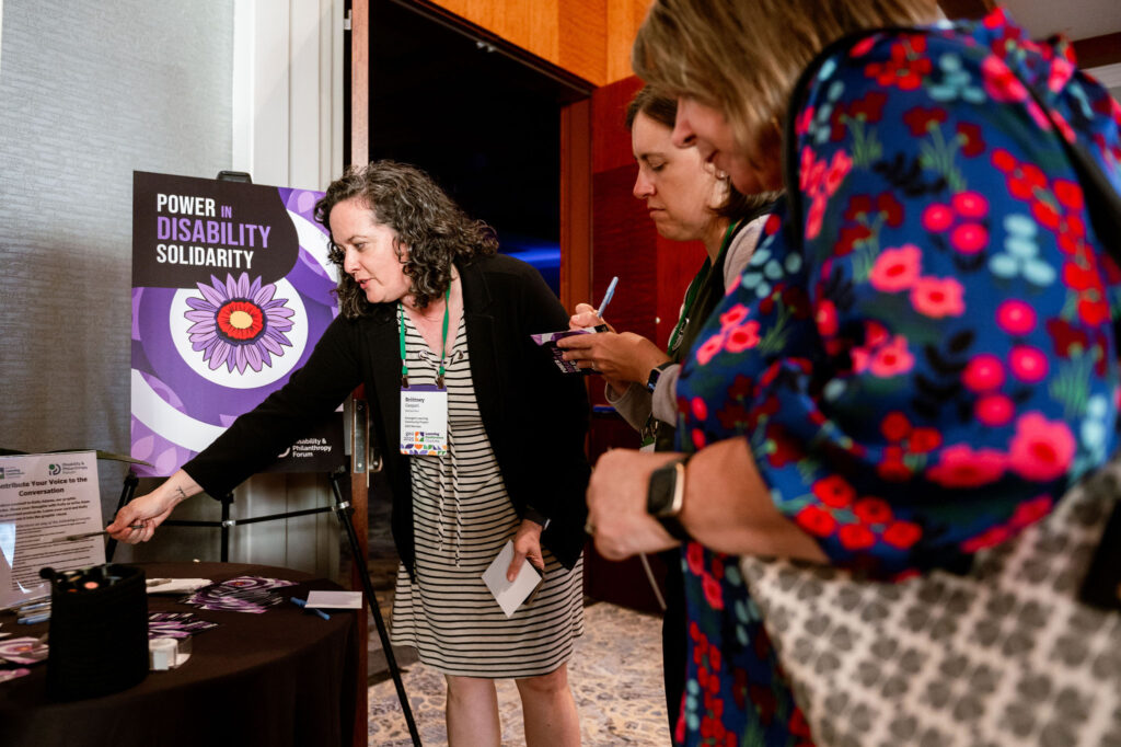 Attendees participate in the alt text writing activity.